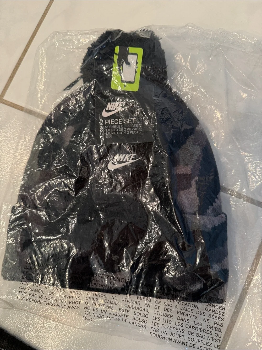 Nike Camo Black/Gray Knit Beanie with a black Pom-Pom. Black gloves to match.